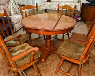 Table showingwithout leaf six chairs