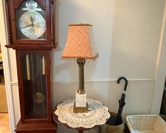 Grandmother clock, side table, baskets,
