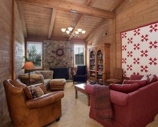 Red couch with red and gray fabric.