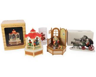 A Collection of Holiday-Themed Figurines and Glassware, including a 1981 Enesco 'Santa's Busy Office' Animated Music Box
