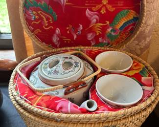 Asian tea set in woven basket 