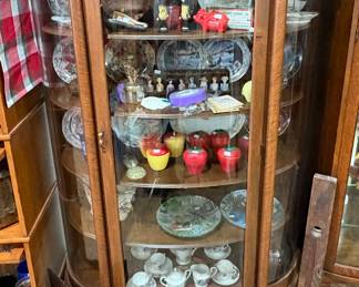 Curved glass claw foot cabinet