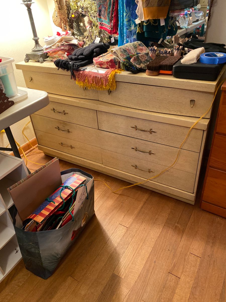 Mid-century modern dresser 
Scarves and gloves 