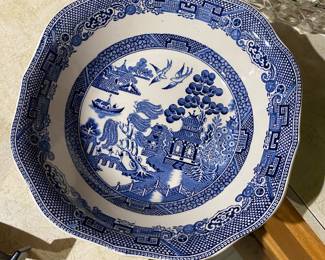 Blue willow plate . (There are no other dishes , just this single plate )