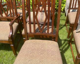solid wood dining chairs. 8. $75 each. Must purchase all.