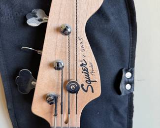 *	#71	Fender Squier P-Bass guitar with case	 $200.00