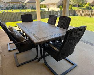 #26	Tile top table with metal base and springy chairs 80x42	 $200.00
