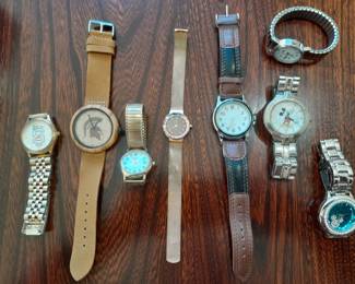 Various watches - some Michigan State Spartan and some Disney