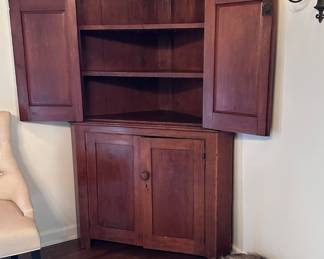 18th Century American country corner cabinet.