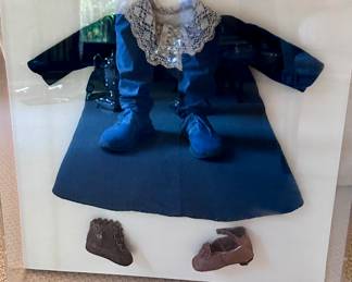 Antique baby dress & shoes framed in lucite