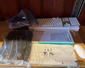 6062  4 Keyboards, Harris WiFi Router, 2 Apple Mice, Power and RCA Cords 