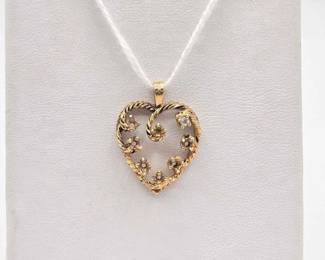 724  14k Gold with Diamond Heart Pendant, 2.3g 