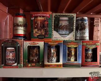 6500  9 Budweiser Holiday Steins 