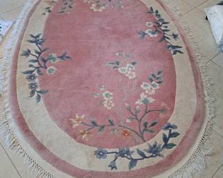 ORIENTAL OVAL RUG