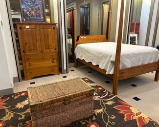 Wicker trunk, pine armoire/4 poster bed