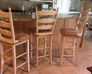 THREE TALL COUNTER STOOLS