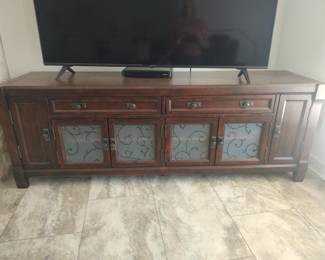 Millennium entertainment console with CD storage on both ends