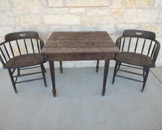 carved table and 2 chairs