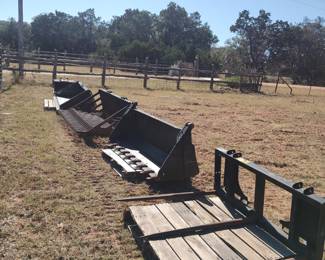 Consigned to BigIron Auction (https://www.bigiron.com/Listings/RobertWornath-2): Bale fork, 6-in-1 bucket, rock bucket, general purpose bucket (all with skid steer quick-attach)