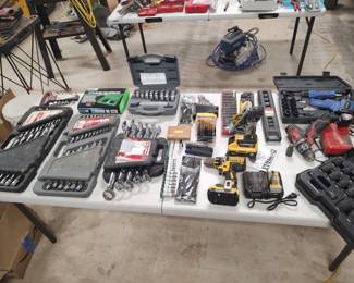 Metric and SAE end wrench sets, socket sets, bearing race drivers, tire repair kit, 3/8" battery operated Dewalt & Milwaukee power drills, 1/2" & 3/8" air impact wrenches, Graco airless paint sprayer, Dewalt battery operated cut-off saw