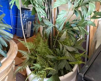 Faux plant in big white pot