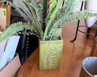 Pair of faux plants in green vases