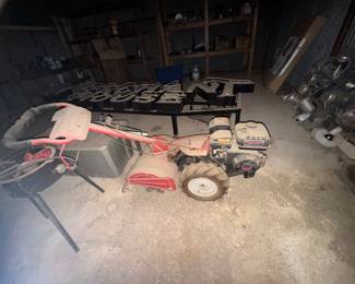 Tiller with Predator engine. Unknown condition but turned over easily