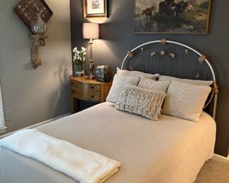 Iron filigree full sized bedframe with mattress and bedding, frame is hand painted in brass, silver and platinum metallic, paid 499 for bed. Linens (full size duvet, two pillow shams, four throw pillows) from Macy’s hotel collection paid $300.