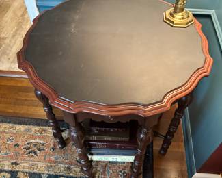 end table, dark wood, English tutor Library curved edge with chalk black top, measures 28 inches wide by 30 inches tall.