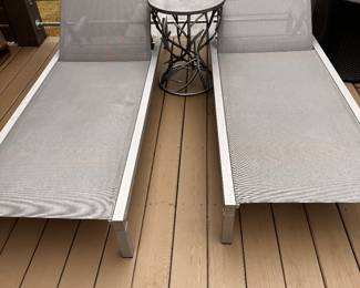 Loungers with aluminum frames in great shape. Center table is very cool a out16" diameter