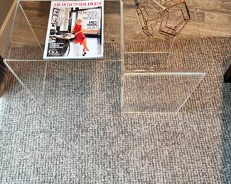Clear acrylic side tables
modern, minimalist aesthetic nesting tables.