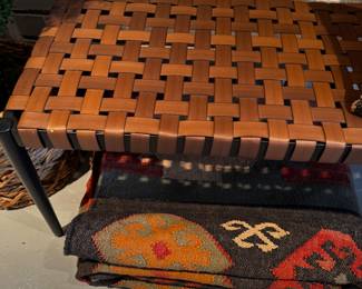 stretched leather strap bench with metal accent is 44" long, 16" tall, 14.5. " deep
Also an Area Rug Hand Knotted Carpet Rug Afghan kilim