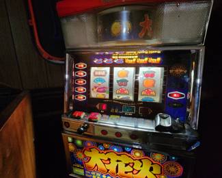 Regulation Japanese slot machine with slugs
