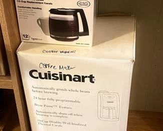 Cuisinart coffee maker and replacement carafe.