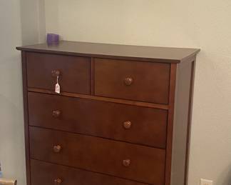 Cherry finish chest of drawers
