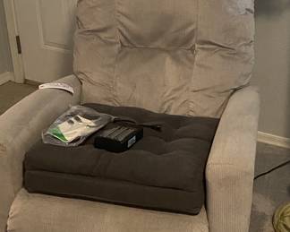 LaZBoy power recliner.  Electric controls and a USB port.  
Also shown: extra cushion.