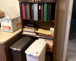 Files folders,  hanging folders,  binders,  other office supplies,  2 trash cans.