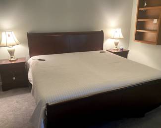 King-size cherry finish bed frame and nightstands.