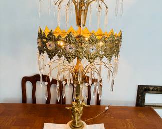 Yes, it's a lamp.  It will definitely start a conversation too.