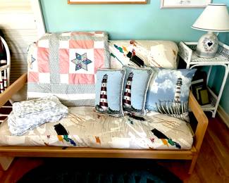 day bed, quilt, pillows