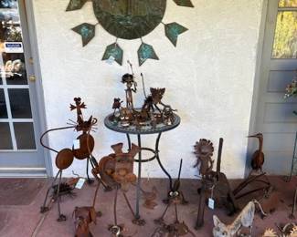 Copper sun and metal garden animals