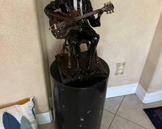 Enamel bronze sculpture by     of     