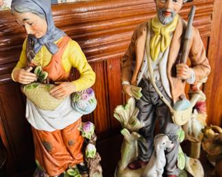 Vintage homecoming porcelain bisque figurines