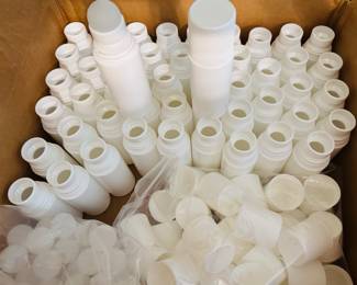 Roll on bottles with balls and caps