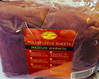 Numerous sets of polar fleece sheets, mostly king and twin