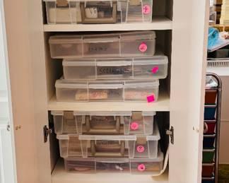 Storage containers mostly full of card stock never used