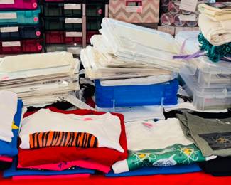 Lots of T-shirts and supplies for heat press