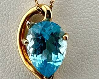 14kt necklace with blue topaz pendant