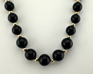 Graduated Onyx bead necklace with 14kt clasp and spacer beads