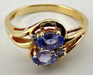 Dual bypass design 14kt oval tanzanite, diamond ring
